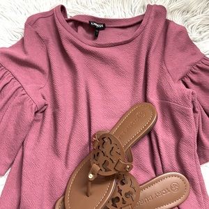 Ruffled sleeves express top